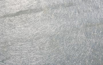 Brokes laminate fibreglass or shingles?